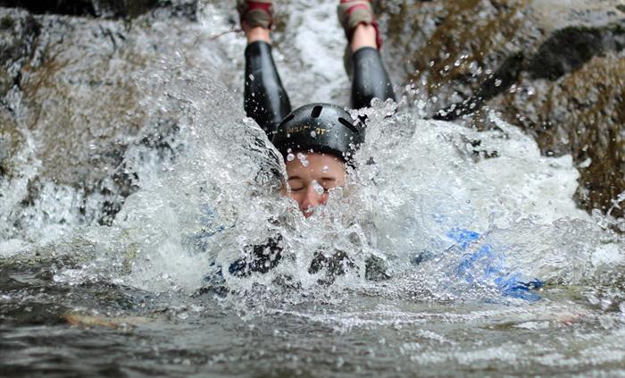 Gorge scrambling in Wales, wild river fun adventurous water activity.
